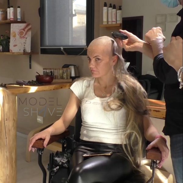 Woman With Long Blond Hair Shaves Her Head Bal