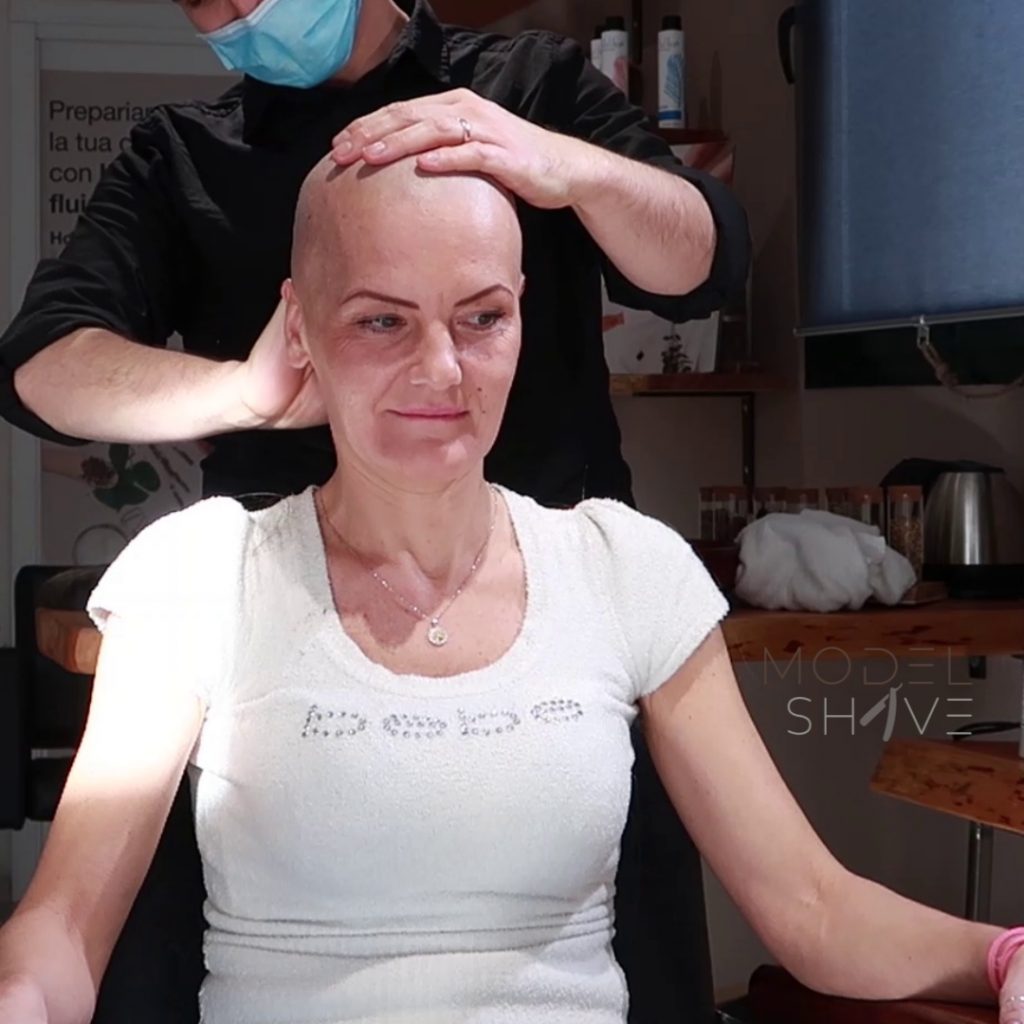 Woman With Long Blond Hair Shaves Her Head Bald At The Hair Salon Model Shave